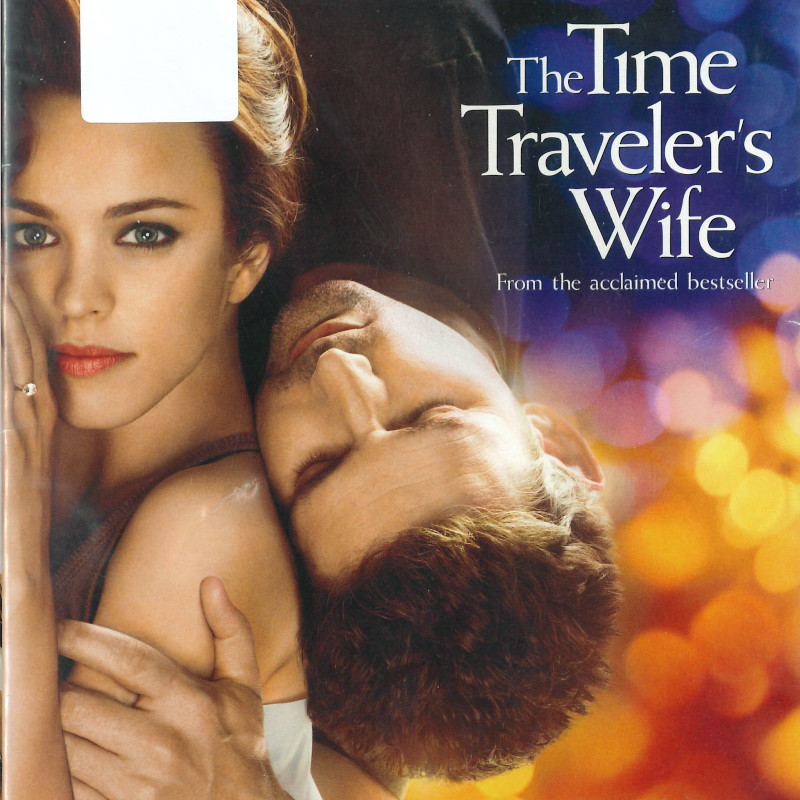 Part of the DVD cover ofThe Time Travelers Wife. Rachel McAdams lying down, wiht Eric Ban lying on top of her romantically. Her face has been smoothed, removing her specific features